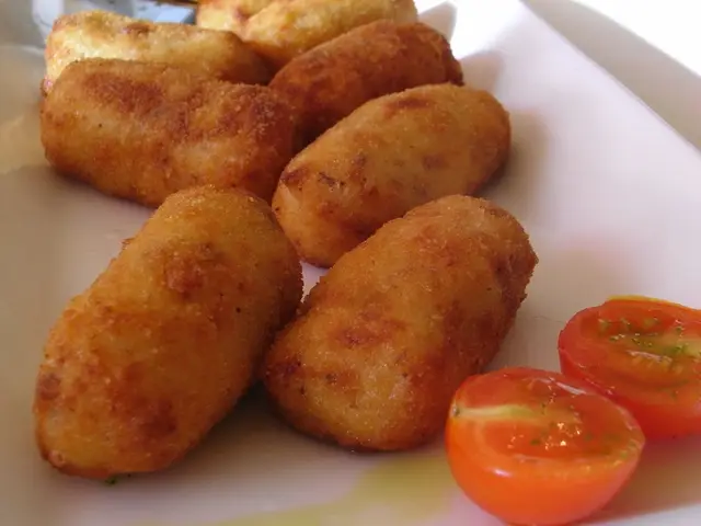 Croquetes cremoses de rostit, plato de La Vinya